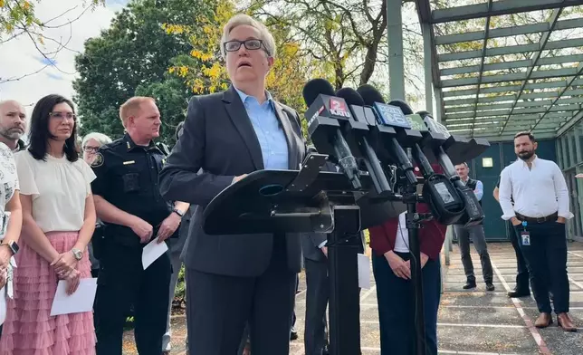 Democratic Oregon Gov. Tina Kotek speaks at a news conference in Portland, Ore., on Saturday, Sept. 27, 2025, after Republican President Donald Trump said he would send troops to the city. (AP Photo/Claire Rush)
