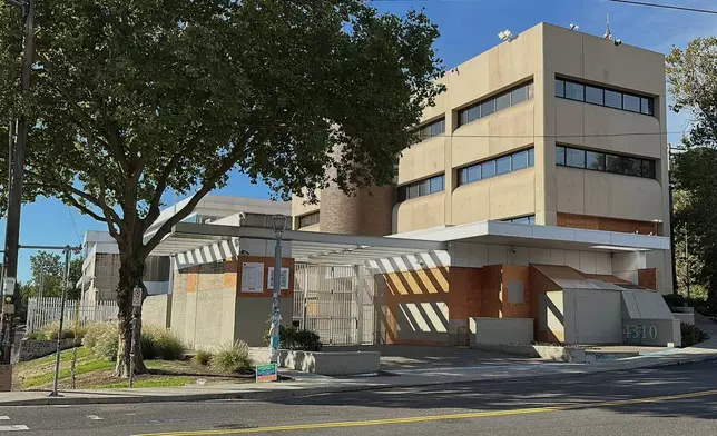 A U.S. Immigration and Customs Enforcement facility is shown on Saturday, Sept. 27, 2025 in Portland, Ore. (AP Photo/Gillian Flaccus)