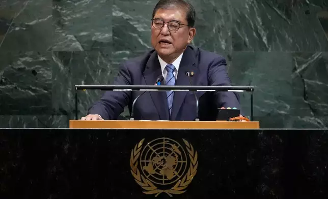 Japan's Prime Minister Shigeru Ishiba addresses the 80th session of the United Nations General Assembly, Tuesday, Sept. 23, 2025, at U.N. headquarters. (AP Photo/Pamela Smith)