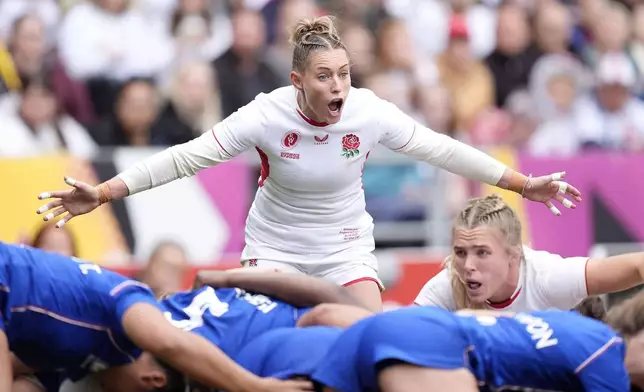 England's Natasha Hunt reacts during the Women's Rugby World Cup 2025 semifinal match between France and England at Ashton Gate, in Bristol, England, Saturday Sept. 20, 2025. (Andrew Matthews/PA via AP)