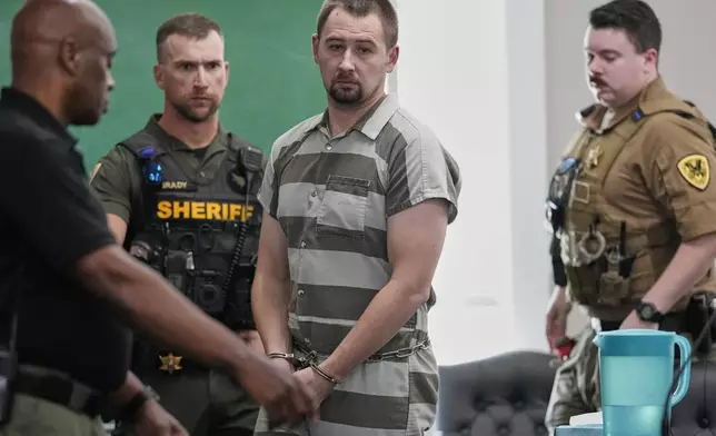 Defendant Austin Drummond, accused of quadruple murder, leaves the courtroom after a preliminary hearing Thursday, Sept. 4, 2025, in Tiptonville, Tenn. (AP Photo/George Walker IV, Pool)