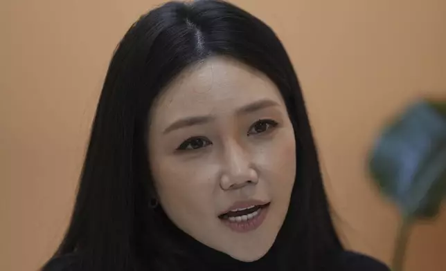 Kim Sho-yun, 45, who runs a cosmetic tattoo studio, speaks during an interview in Hanam, South Korea, Thursday, Sept. 18, 2025. (AP Photo/Lee Jin-man)