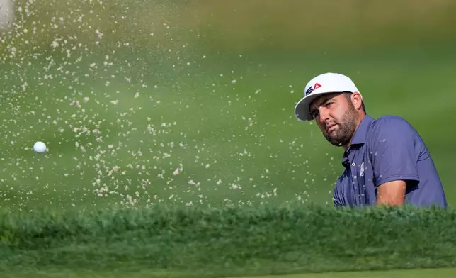 United States' Scottie Scheffler hits from the bunker on the 11th hole during a practice round for the Ryder Cup golf tournament, Tuesday, Sept. 23, 2025, in Farmingdale, N.Y., at Bethpage State Park's Black Course. (AP Photo/Robert Bukaty)
