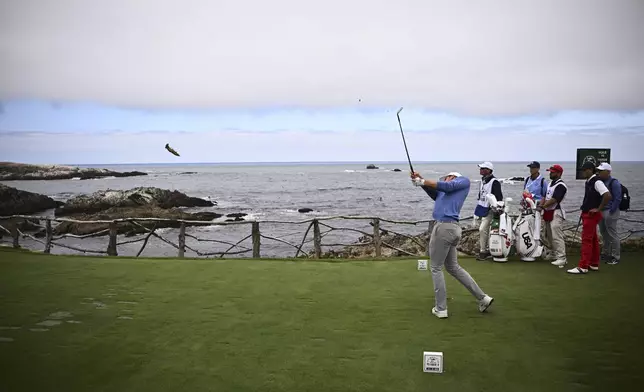 The Great Britain and Ireland team's Tyler Weaver hits from the 15th tee during Walker Cup golf matches against the USA team at Cypress Point Club on Saturday, Sept. 6, 2025, in Pebble Beach, Calif. (AP Photo/Thien-An Truong)