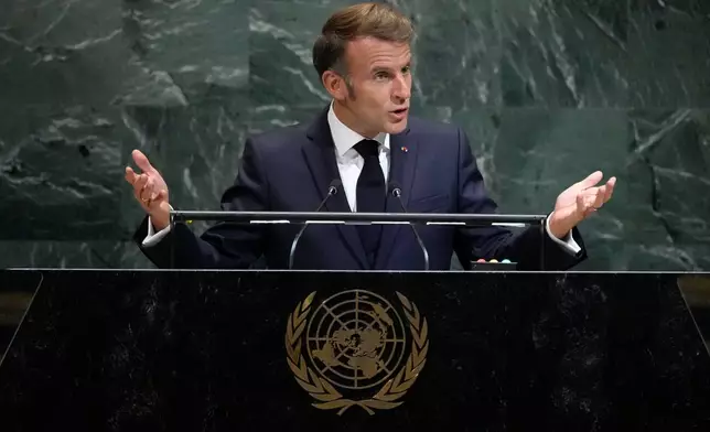 President of France Emmanuel Macron addresses the 80th session of the United Nations General Assembly, Tuesday, Sept. 23, 2025, at U.N. headquarters. (AP Photo/Pamela Smith)