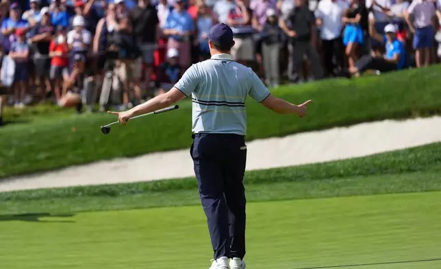 Europe's Matthew Fitzpatrick celebrates their win on the 15th hole at Bethpage Black golf course during the Ryder Cup golf tournament, Friday, Sept. 26, 2025, in Farmingdale, N.Y. (AP Photo/Lindsey Wasson)
