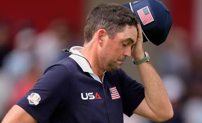 United States captain Keegan Bradley reacts on the second hole at Bethpage Black golf course during the Ryder Cup golf tournament, Saturday, Sept. 27, 2025, in Farmingdale, N.Y. (AP Photo/Robert Bukaty)
