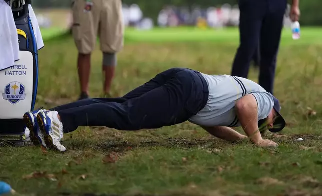 Europe's Tyrrell Hatton looks at the ball in the rough on the seventh hole at Bethpage Black golf course during the Ryder Cup golf tournament, Friday, Sept. 26, 2025, in Farmingdale, N.Y. (AP Photo/Matt Slocum)