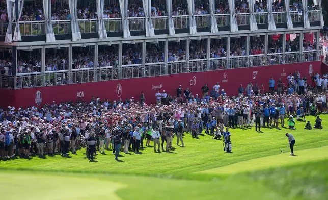 Europe's Tyrrell Hatton hits from the fairway on the 15th hole at Bethpage Black golf course during the Ryder Cup golf tournament, Friday, Sept. 26, 2025, in Farmingdale, N.Y. (AP Photo/Matt Slocum)