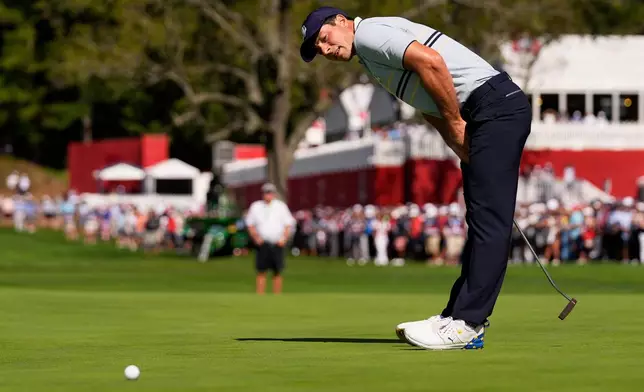 Europe's Viktor Hovland reacts after missing a putt on the 16th hole at Bethpage Black golf course during the Ryder Cup golf matches, Friday, Sept. 26, 2025, in Farmingdale, N.Y. (AP Photo/Robert Bukaty)