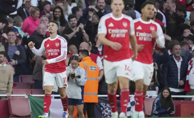 Arsenal's Gabriel Martinelli reacts after scoring during the Premier League soccer match between Arsenal and Manchester City in London, Sunday, Sept. 21, 2025. (AP Photo/Kin Cheung)