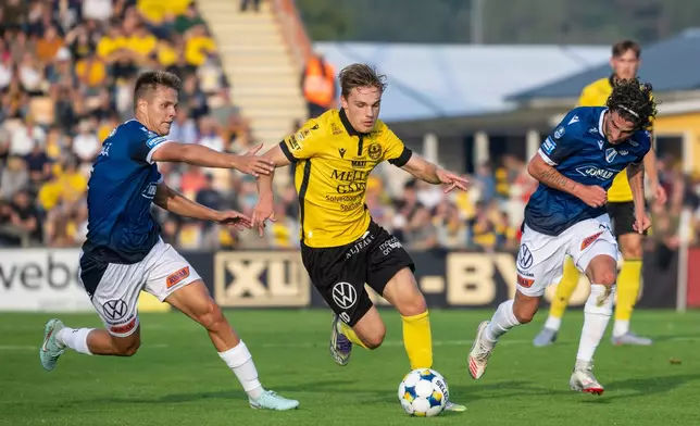 Mjallby's Jeppe Kjaer Jensen drives the ball during the soccer match between Mjallby AIF and Halmstad BK at Strandvallen in Hallevik, Sweden, Saturday Aug. 30, 2025. (Johan Nilsson /TT News Agency via AP)