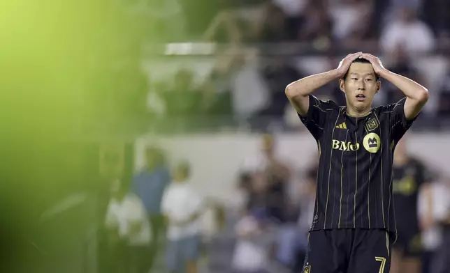 Los Angeles FC forward Son Heung-Min reacts during the second half of an MLS soccer match against San Diego FC Sunday, Aug. 31, 2025, in Los Angeles, Calif. (AP Photo/Eric Thayer)