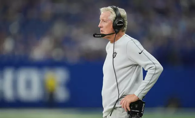 Las Vegas Raiders head coach Pete Carroll watches during the second half of an NFL football game against the Indianapolis Colts, Sunday, Oct. 5, 2025, in Indianapolis. (AP Photo/Michael Conroy)