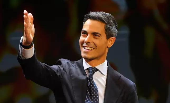 Rob Jetten, leader of the center-left D66 party, speaks on stage during exit poll results an election venue during a general election in Leiden, Netherlands, Wednesday, Oct. 29, 2025. (AP Photo/Peter Dejong)