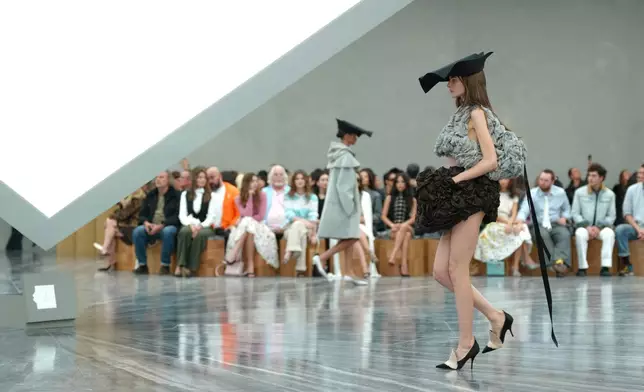 A model wears a creation as part of the Dior Spring/Summer 2026 collection presented in Paris, Wednesday, Oct. 1, 2025. (AP Photo/Aurelien Morissard)