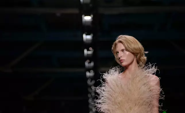 A model wears a creation as part of the Stella McCartney Spring/Summer 2026 collection presented in Paris, Tuesday, Sept. 30, 2025. (AP Photo/Aurelien Morissard)