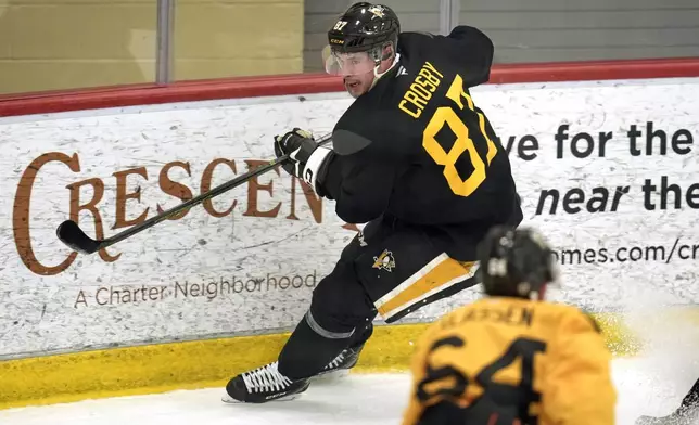 Pittsburgh Penguins Sidney Crosby participates in a drilduring the first day of the NHL hockey training camp, Thursday, Sept. 18, 2025 in Cranberry, Pa. (AP Photo/Gene J. Puskar)
