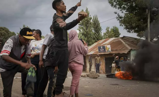 People protest in the streets of Arusha, Tanzania, on election day Wednesday, Oct. 29, 2025. (AP Photo/str)