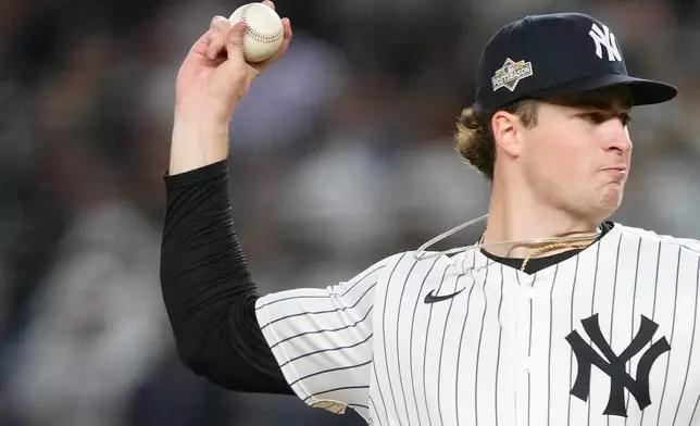 New York Yankees pitcher Cam Schlittler delivers against the Boston Red Sox during the eighth inning of Game 3 of an American League wild-card baseball playoff series, Thursday, Oct. 2, 2025, in New York. (AP Photo/Yuki Iwamura)