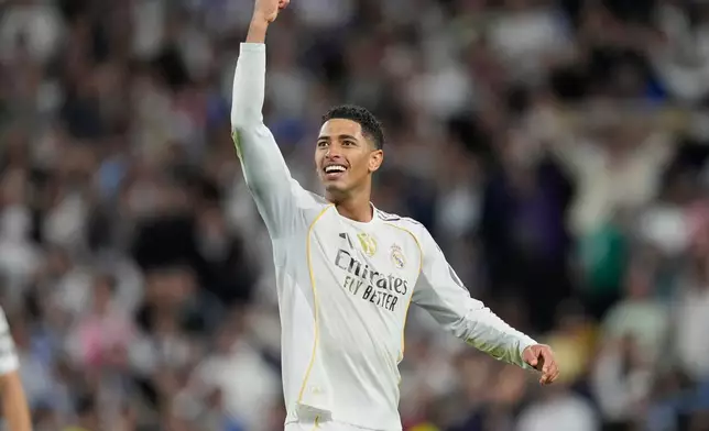 Real Madrid's Jude Bellingham reacts after a La Liga soccer match between Real Madrid and Barcelona in Madrid, Spain, Sunday, Oct. 26, 2025. (AP Photo/Bernat Armangue)