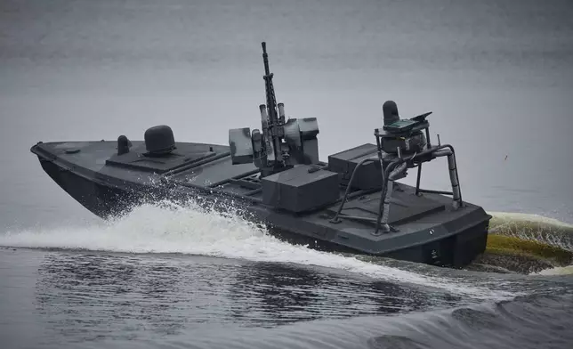A Sea Baby drone rides on the water during a demonstration by Ukraine's Security Service in an undisclosed location in Ukraine Friday, Oct. 17, 2025. (AP Photo/Efrem Lukatsky)