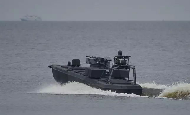 A Sea Baby drone rides on the water during a demonstration by Ukraine's Security Service in an undisclosed location in Ukraine Friday, Oct. 17, 2025. (AP Photo/Efrem Lukatsky)