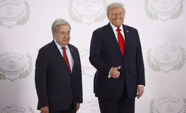President Donald Trump and United Nations Secretary-General Antonio Guterres pose during the greeting ceremony before the family picture at the Gaza International Peace Summit, in Sharm el-Sheikh, Egypt, Monday, Oct.13 2025. (Yoan Valat, Pool photo via AP)