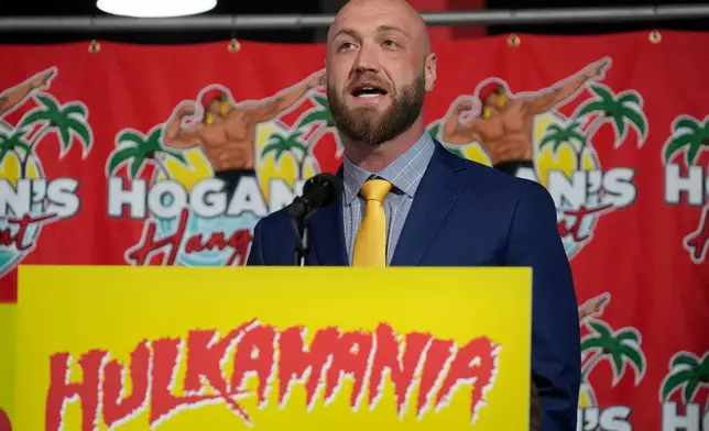 Nick Hogan, son of wrestling legend Hulk Hogan, speaks after Florida Gov. Ron DeSantis named a trail in honor of Hulk Hogan during a news conference Friday, Oct. 3, 2025, in Clearwater, Fla. (AP Photo/Chris O'Meara)