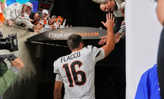 Cincinnati Bengals quarterback Joe Flacco walks off the field following an NFL football game against the Pittsburgh Steelers in Cincinnati Thursday, Oct. 16, 2025. (AP Photo/Jeff Dean)
