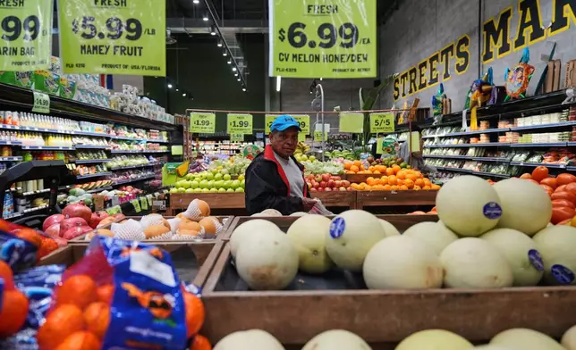 A person shops for produce, which is covered by the USDA Supplemental Nutrition Assistance Program (SNAP), at a grocery store in Baltimore, Thursday, Oct. 30, 2025. (AP Photo/Stephanie Scarbrough)