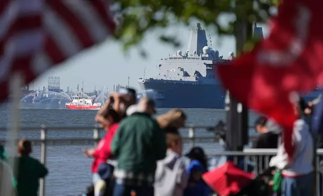 USS Billings passes the viewing stand during the 250th anniversary of the founding of the U.S. Navy and Marine Corps, along the Delaware River, Thursday, Oct. 9, 2025, in Philadelphia. (AP Photo/Matt Rourke)