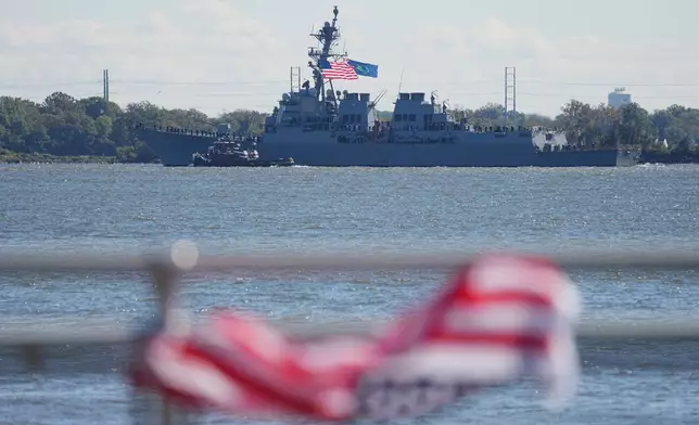 The USS Lassen passes the viewing stand during the 250th anniversary of the founding of the U.S. Navy and Marine Corps, along the Delaware River, Thursday, Oct. 9, 2025, in Philadelphia. (AP Photo/Matt Rourke)