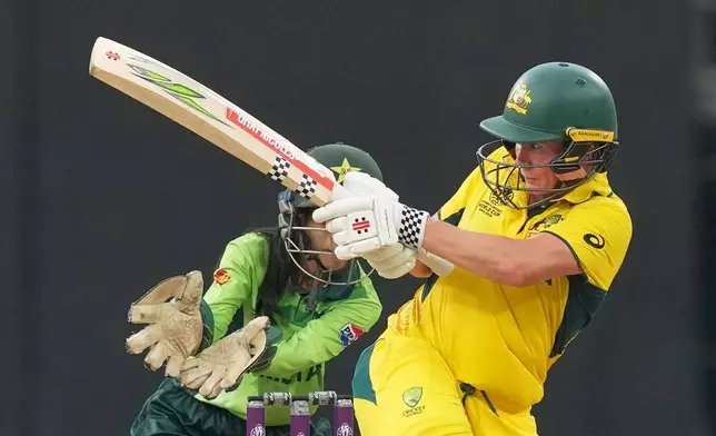 Australia's Beth Mooney plays a shot during the ICC Women's Cricket World Cup match between Australia and Pakistan at Premadasa Stadium in Colombo, Sri Lanka, Wednesday, Oct, 8, 2025. (AP Photo/Eranga Jayawardena)