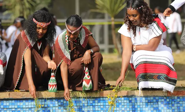 People attend the annual thanksgiving celebrations in Addis Ababa, Ethiopia, Saturday, Oct 4, 2025. (AP Photo/Amanuel Birhane)