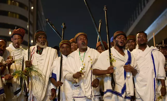 People attend the annual thanksgiving celebrations in Addis Ababa, Ethiopia, Saturday, Oct 4, 2025. (AP Photo/Amanuel Birhane)
