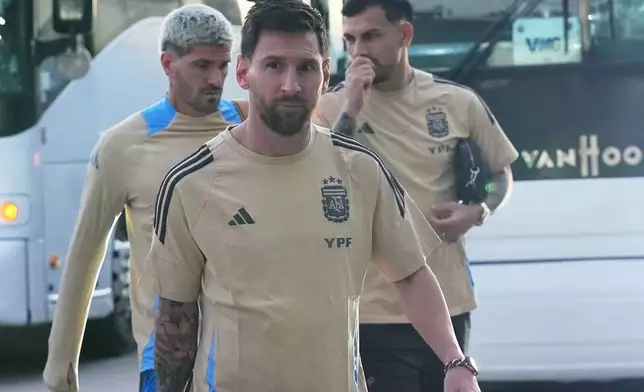 Lionel Messi arrives for a friendly soccer match against Puerto Rico, Tuesday, Oct. 14, 2025, in Fort Lauderdale, Fla. (AP Photo/Marta Lavandier)