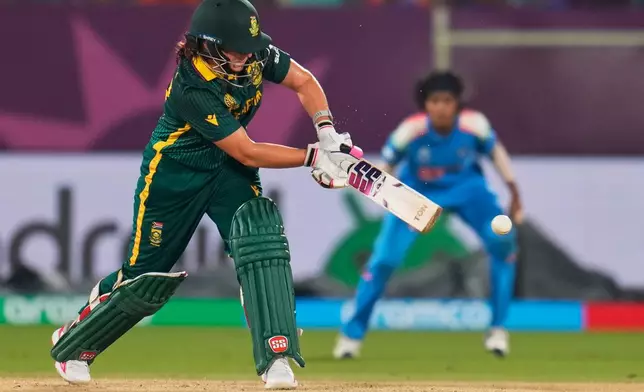 South Africa's Nadine de Klerk plays a shot during the ICC Women's Cricket World Cup match between India and South Africa at ACA-VDCA Cricket Stadium in Visakhapatnam, India, Thursday, Oct. 9, 2025. (AP Photo/Aijaz Rahi)
