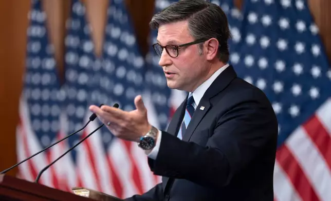 With his personal Bible on the lectern, Speaker of the House Mike Johnson, R-La., holds a news conference to mark the seventh day of the government shutdown, at the Capitol in Washington, Tuesday, Oct. 7, 2025. (AP Photo/J. Scott Applewhite)