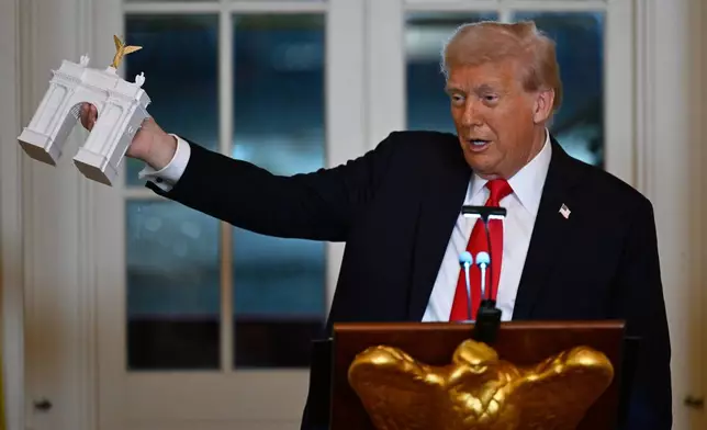 President Donald Trump addresses a dinner for donors who have contributed to build the new ballroom at the White House, Wednesday, Oct. 15, 2025, in Washington. (AP Photo/John McDonnell)