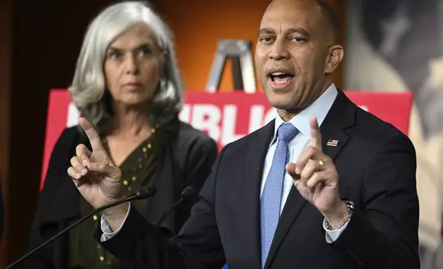 House Minority Leader Hakeem Jeffries, D-N.Y.,, right, and Minority Whip Katherine Clark, D-Mass., participate in a news conference on the 8th day of government shutdown at the U.S. Capitol on Wednesday, Oct. 8, 2025, in Washington. (AP Photo/John McDonnell)