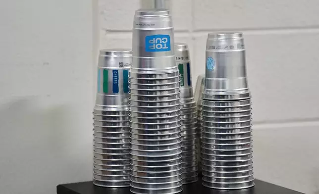 Aluminum cups are stacked during an NFL football game in Philadelphia, Sunday, Sept. 21, 2025. (AP Photo/Matt Rourke)