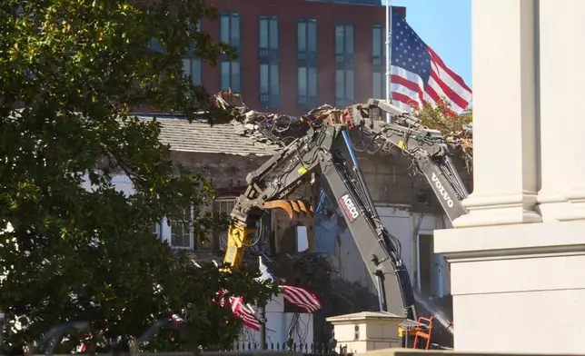 Work continues on the demolition of a part of the East Wing of the White House, Tuesday, Oct. 21, 2025, in Washington, before construction of a new ballroom. (AP Photo/Jacquelyn Martin)