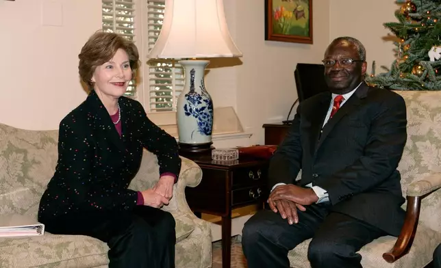 FILE - First lady Laura Bush, left, meets with U.N. Special Adviser on Burma Ibrahim Gambari in her East Wing office of the White House in Washington, Dec. 17, 2007. (AP Photo/Evan Vucci, File)