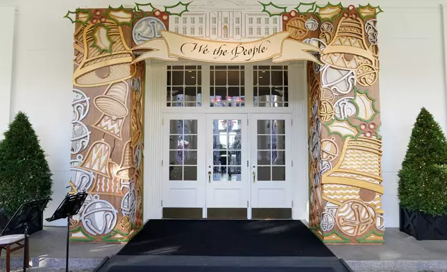 FILE - The entrance to the East Wing of the White House is decorated for the holiday season, Nov. 28, 2022, in Washington. (AP Photo/Patrick Semansky, File)