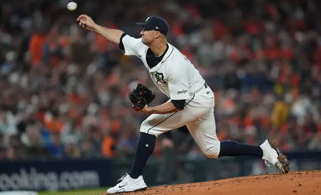 Detroit Tigers starting pitcher Jack Flaherty throws during the second inning in Game 3 of baseball's American League Division Series against the Seattle Mariners Tuesday, Oct. 7, 2025, in Detroit. (AP Photo/Paul Sancya)