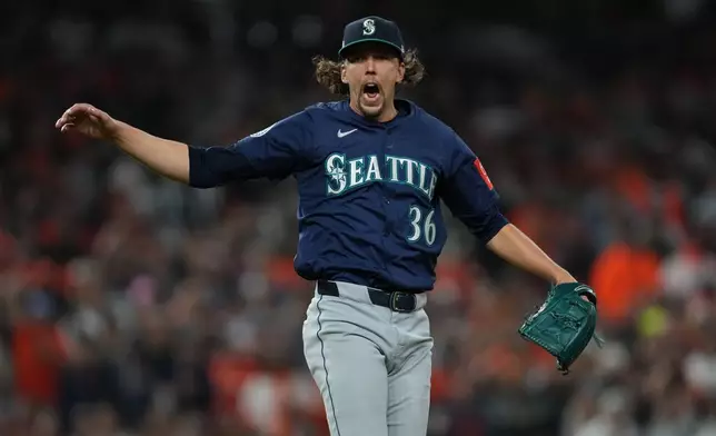 Seattle Mariners starting pitcher Logan Gilbert reacts after striking out Detroit Tigers' Parker Meadows to end the second inning in Game 3 of baseball's American League Division Series Tuesday, Oct. 7, 2025, in Detroit. (AP Photo/Paul Sancya)