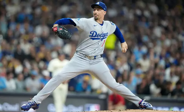 Los Angeles Dodgers pitcher Blake Snell throws against the Milwaukee Brewers during the second inning in Game 1 of baseball's National League Championship Series, Monday, Oct. 13, 2025, in Milwaukee. (AP Photo/Brynn Anderson)
