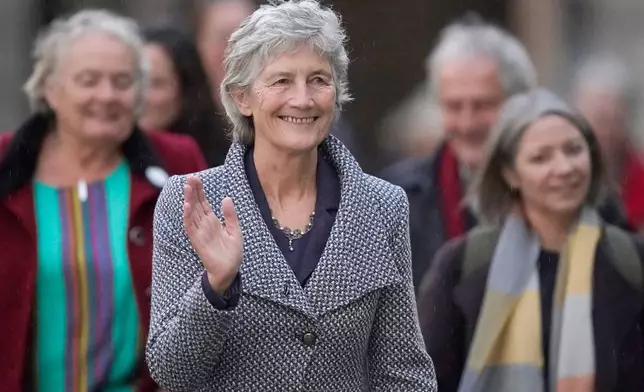 Left-wing independent presidential candidate Catherine Connolly arrives at Dublin Castle for the count in Ireland's presidential election to replace Michael D. Higgins, who has served the maximum two seven-year terms, on Saturday, Oct. 25, 2025. (Niall Carson/PA via AP)