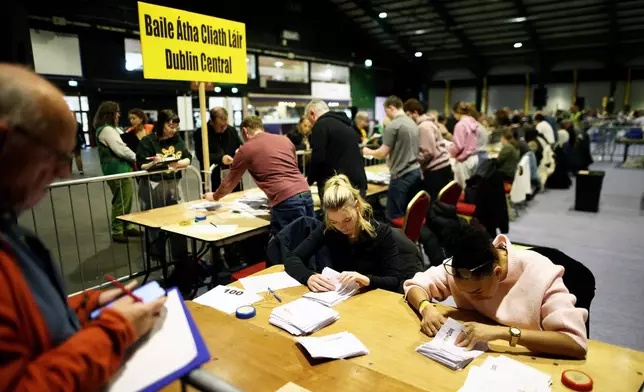 Counting gets under way after Friday's voting in the Irish presidential election at the RDS, Dublin, Ireland, Saturday, Oct. 25, 2025. (AP Photo/Peter Morrison)